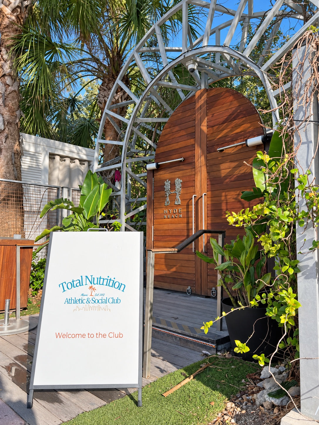 Total Nutrition Athletic & Social Club welcome sign outside the Hyde Beach entrance.